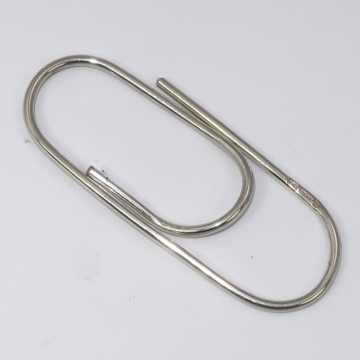 Giant silver paperclip
